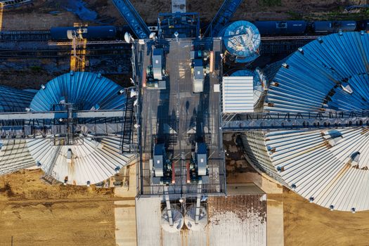 Aerial shot of industrial silos and railway tracks in Randolph, showcasing storage facilities.